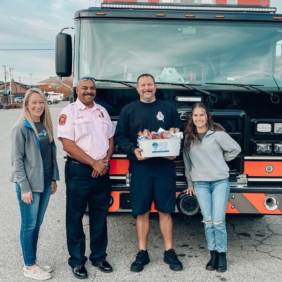 with happy clients holmes palmer orthodontics